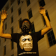 A demonstrator holds his hands up in protest near Lafayette Park and the White House on June 3, 2020 in Washington, DC. Protests in cities throughout the country continue in the wake of the death of George Floyd, a black man who was killed in police custody in Minneapolis on May 25.